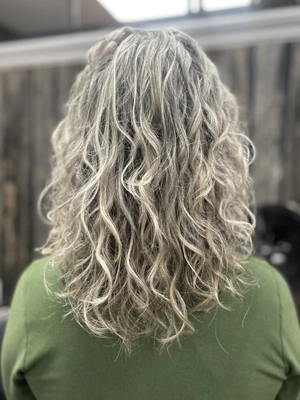 Silver blonde curls with dark rooted base by Alexis