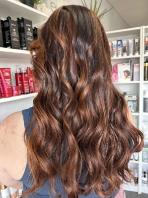 Auburn brunette with copper balayage by Alexis