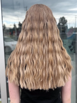 Long sandy blonde with textured waves by Alysha