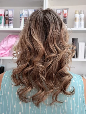 Long caramel blonde with soft waves by Alysha
