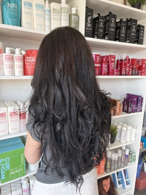 Long dark brunette with loose waves by Breanna