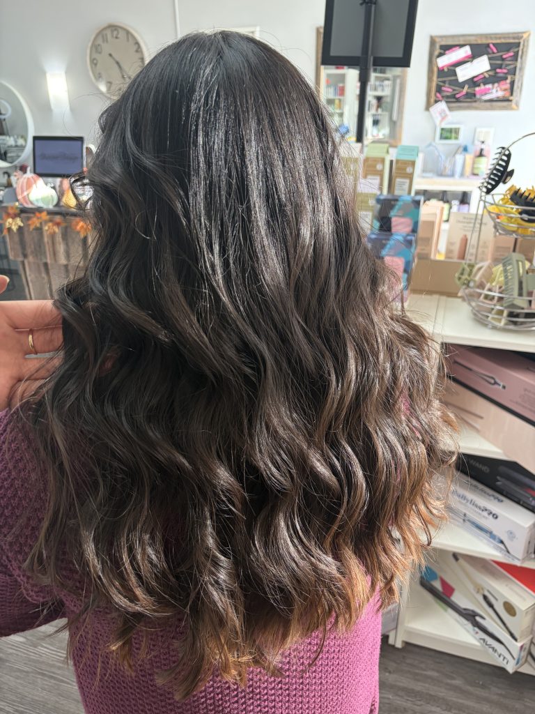 Long dark brunette with caramel balayage by Breanna