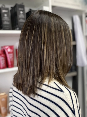 Shoulder-length cool brunette blunt cut by Chloe