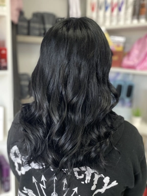 Long black hair with soft waves by Chloe