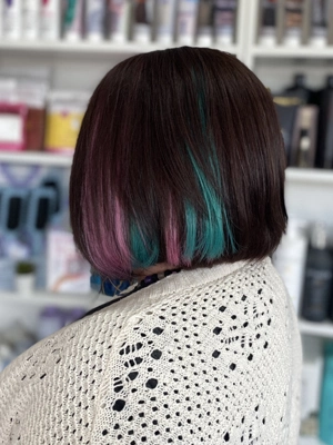 Dark bob with magenta and teal accents by Chloe