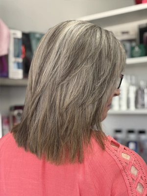 Ash blonde shoulder-length with soft waves by Jenn