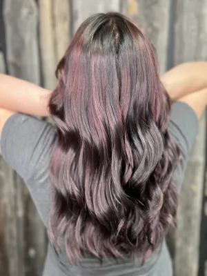 Dark hair with soft pink and lilac tones by Madi