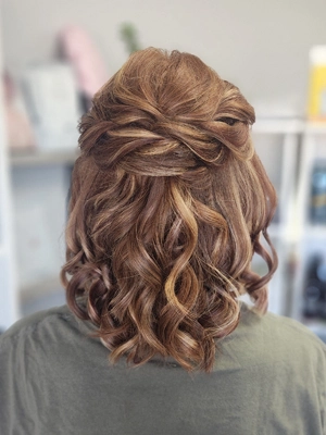 Half-up curled style with twisted detail by Sherri