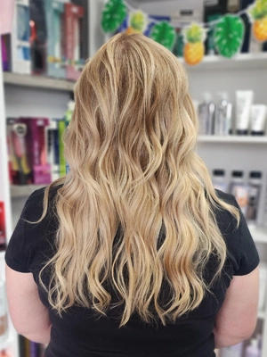 Long golden blonde with soft waves by Sherri